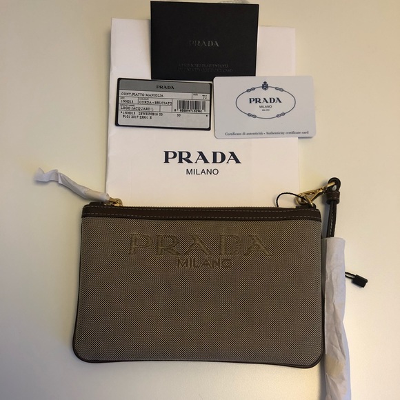 Prada Handbags - Prada Logo Jacquard Beige Wristlet NWT Authentic